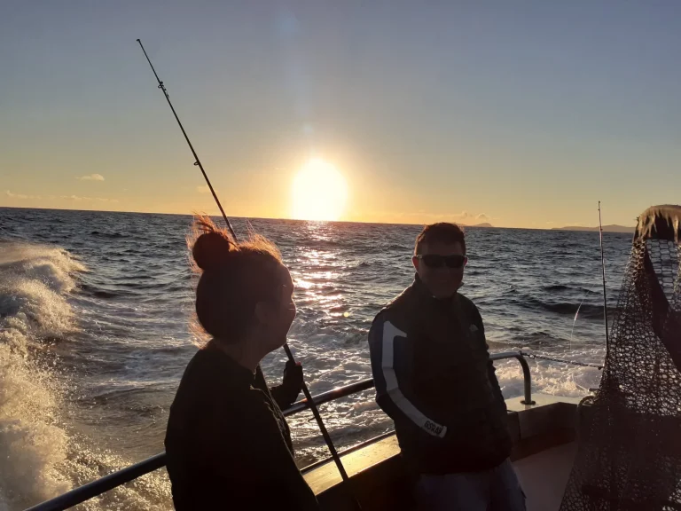 anna-samoylova-w55SpMmoPgE-unsplash Anglers fishing from the boat at sunset off Kerry