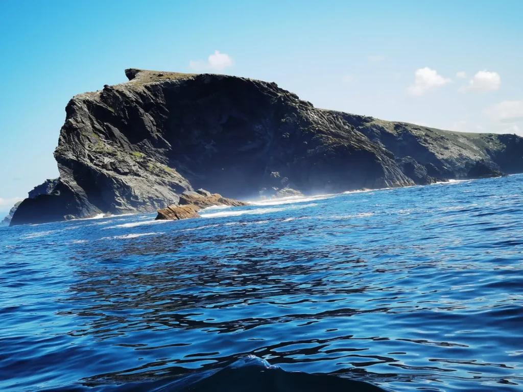 Rocky island under a blue sky off South Kerry