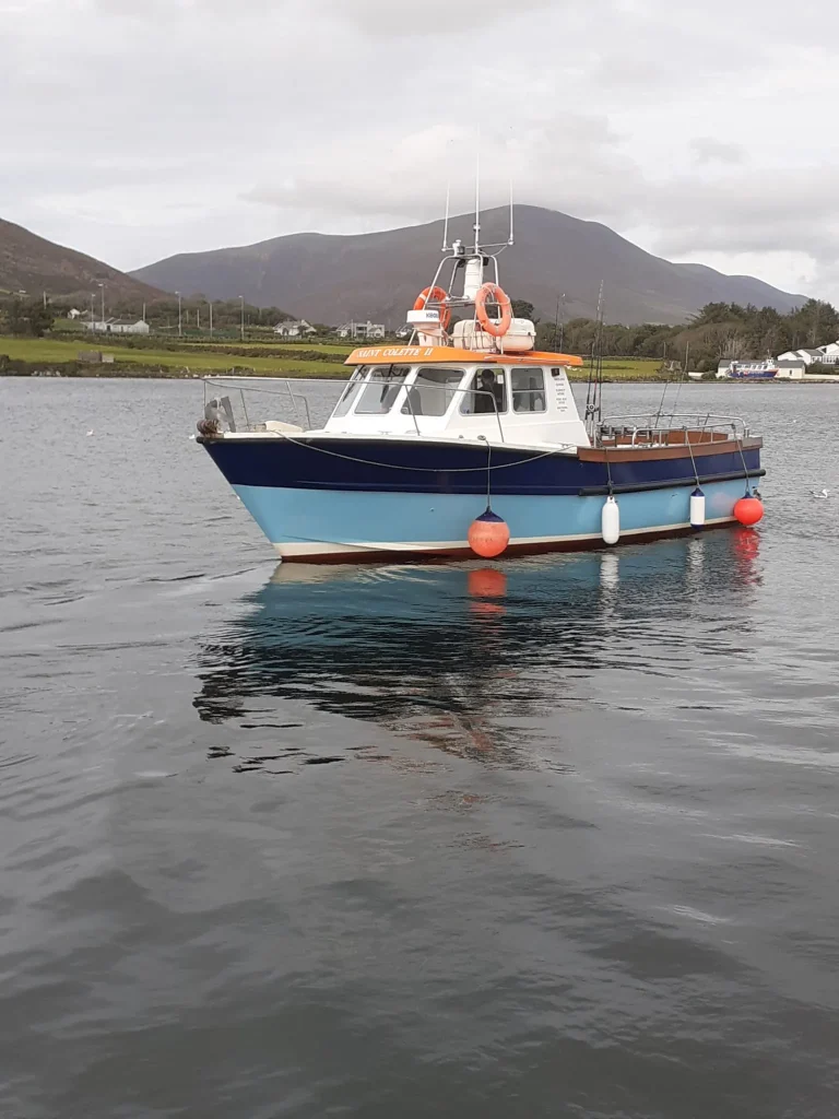 Saint Colette II moored on calm water