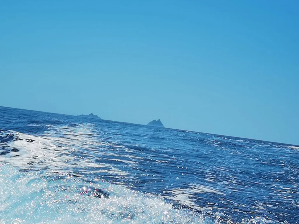The Skellig Islands on the horizon seen from the boat